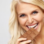 woman-eating-chocolate-bar